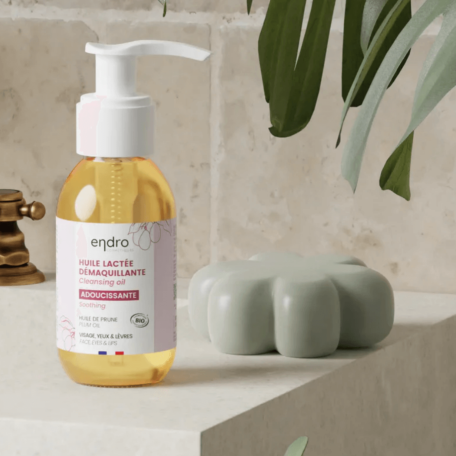 Double cleansing oil with natural ingredients in a clean beauty setting for a radiant face cleaning routine.
