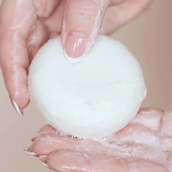 Solid shampoo for normal hair, made with natural ingredients, offering clean beauty and eco-friendly skincare.