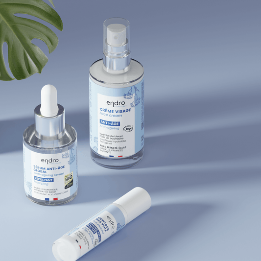 Anti-aging skincare products featuring clean beauty ingredients for hydration and firmness in a day routine, French-made.