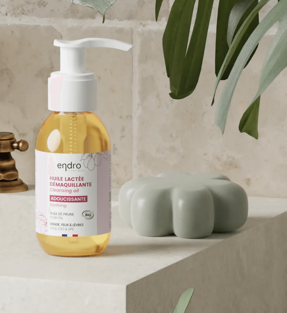 Double cleansing oil with natural ingredients in a clean beauty setting for a radiant face cleaning routine.