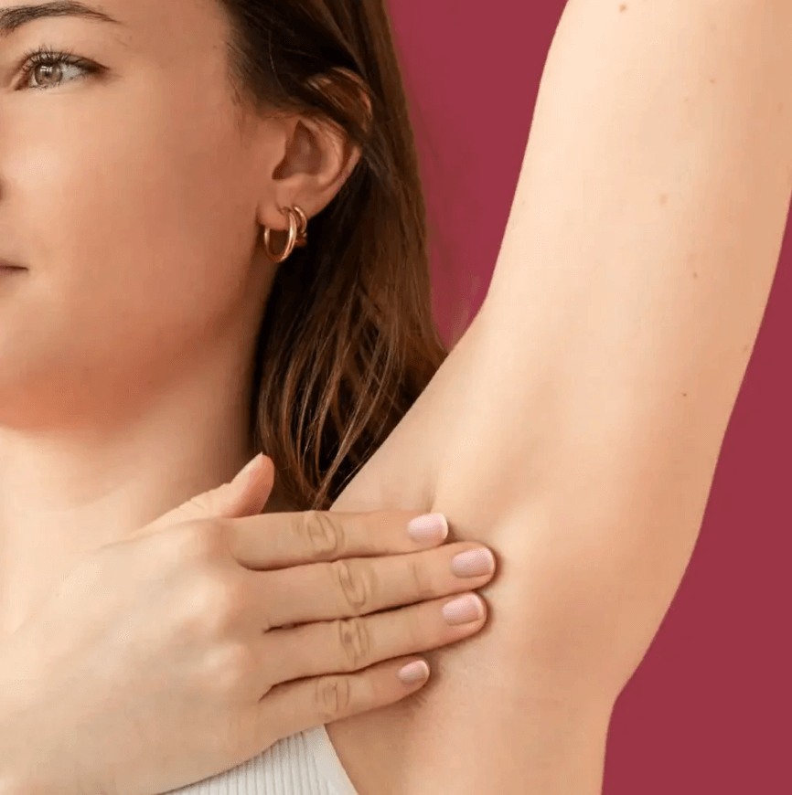 Applying natural, aluminium-free deodorant for clean beauty. Perfect for all skin types and effective for 48 hours.