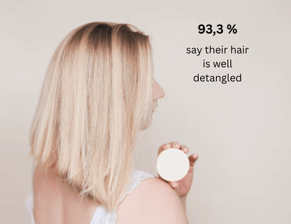 Solid conditioner for all hair types promoting detangled, nourished hair with natural ingredients and zero waste packaging.