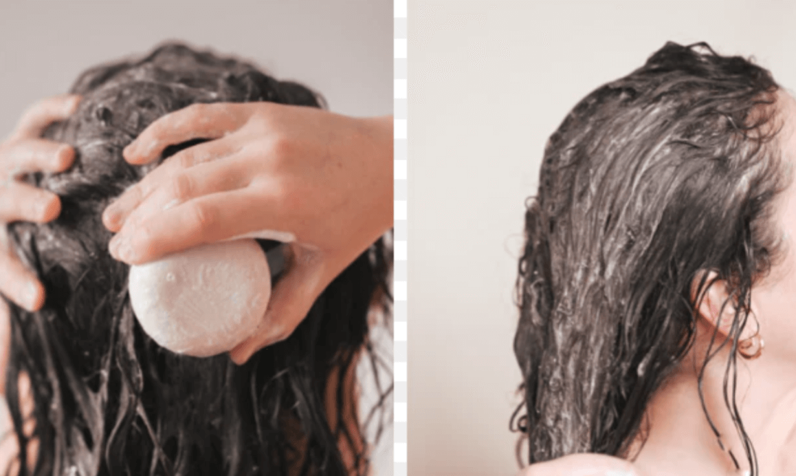 Applying natural sulfate-free solid shampoo for curly hair, showcasing hydration and curl definition.